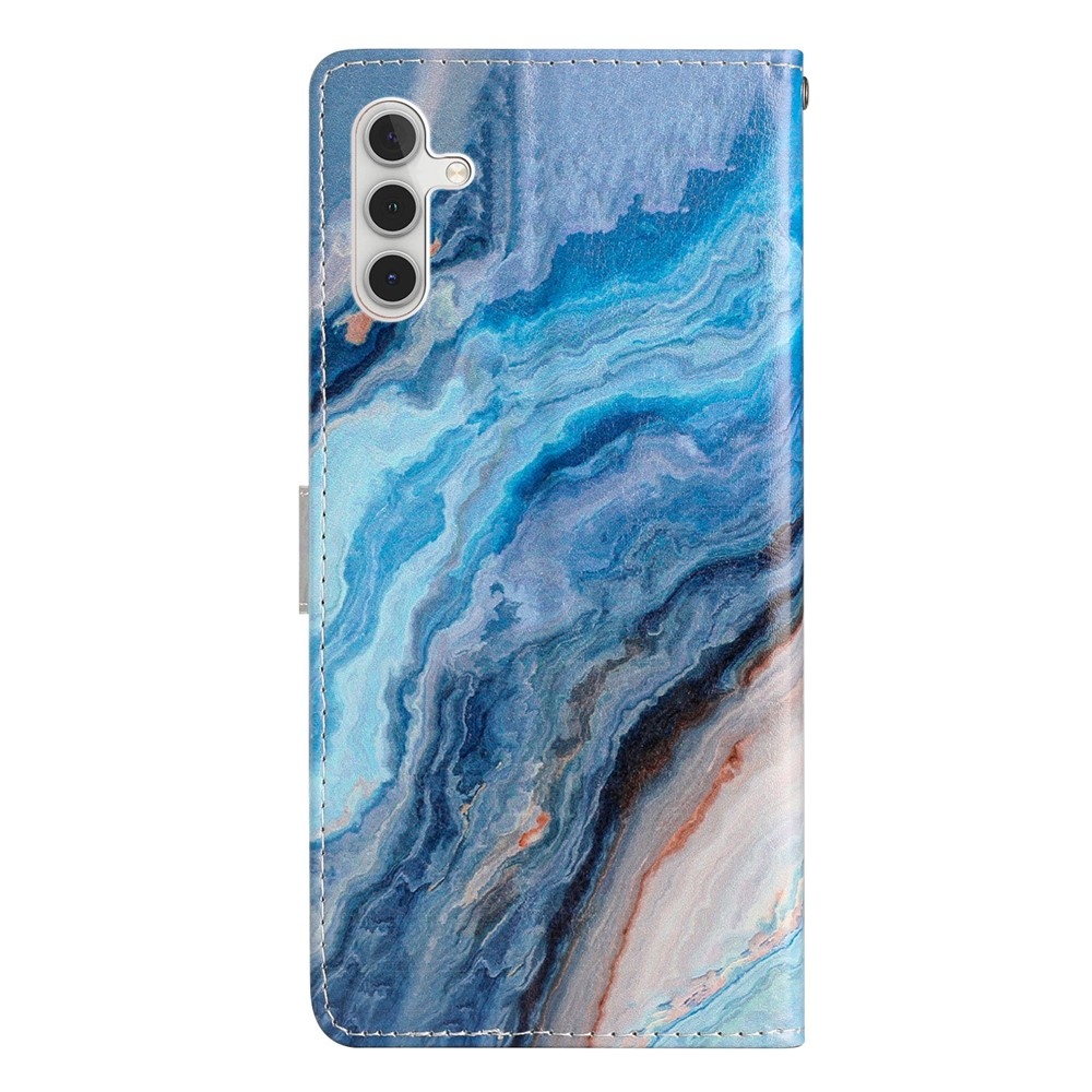 Unique knížkové pouzdro na Samsung Galaxy S25 FE - modrý mramor
