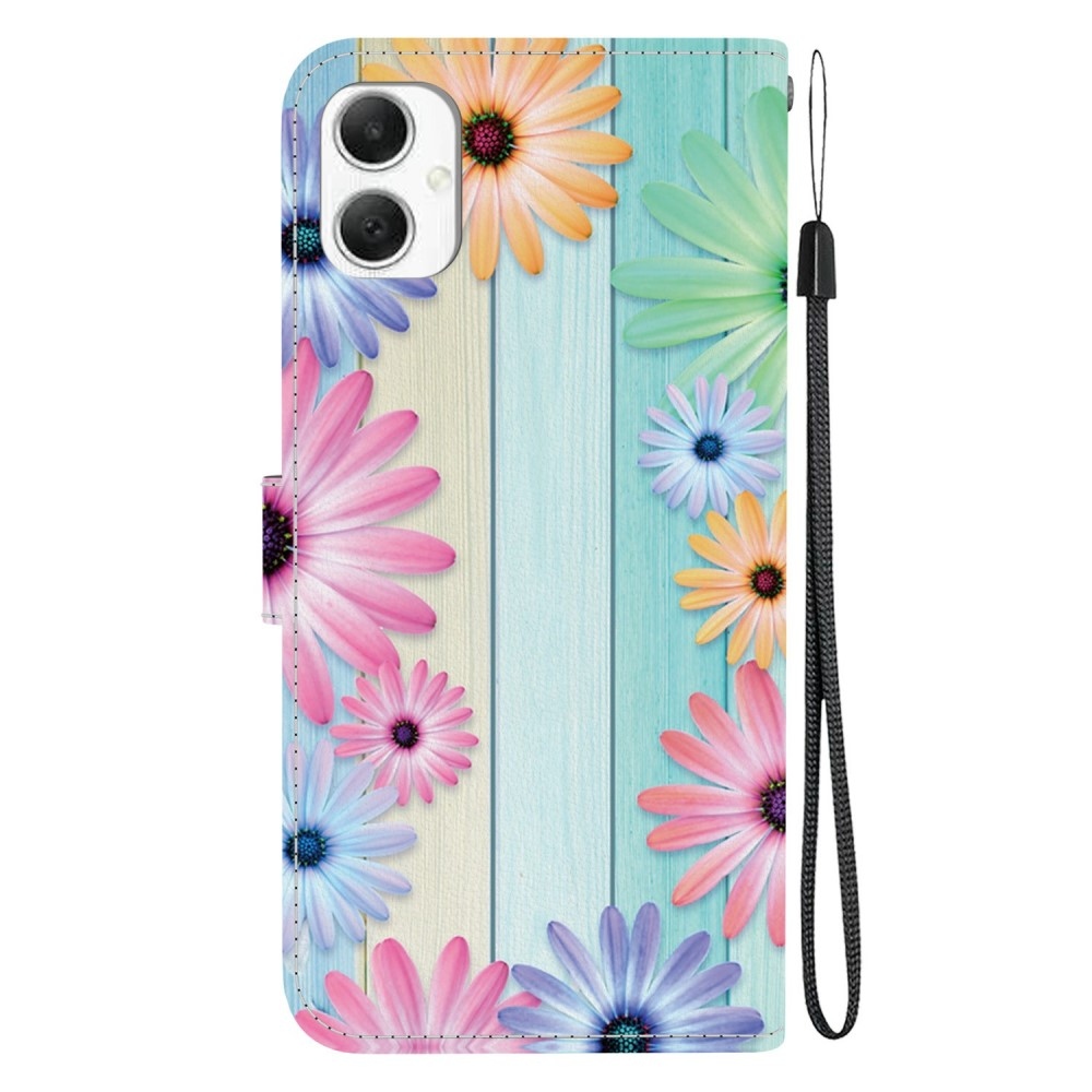 Versatile knížkové pouzdro na Samsung Galaxy A06 4G - barevné gerbery