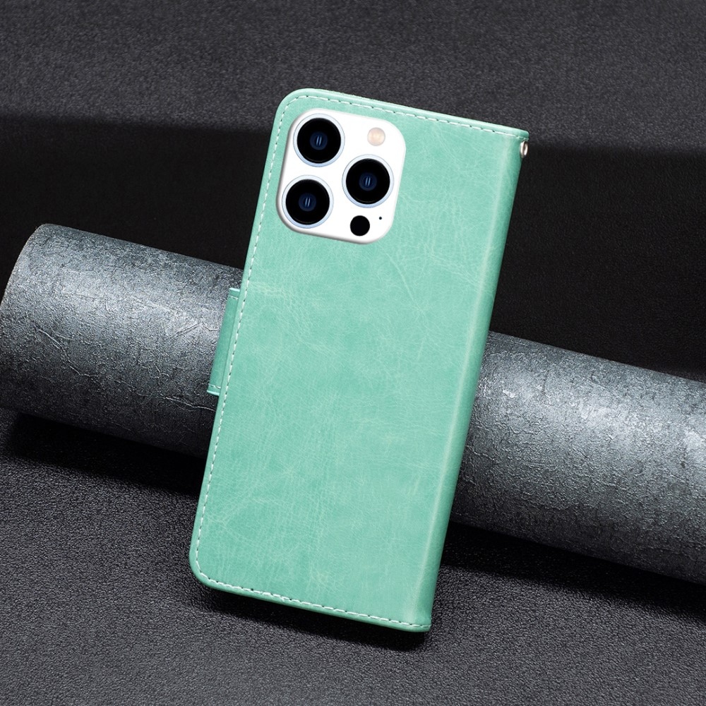 Butterfly knížkové pouzdro na iPhone 16 Pro - modrozelené