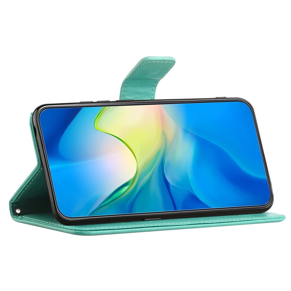 Flower knížkové pouzdro na Samsung Galaxy S24 - modrozelené