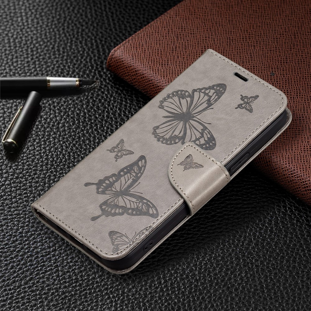 Butterfly knížkové pouzdro na iPhone 16 - šedé