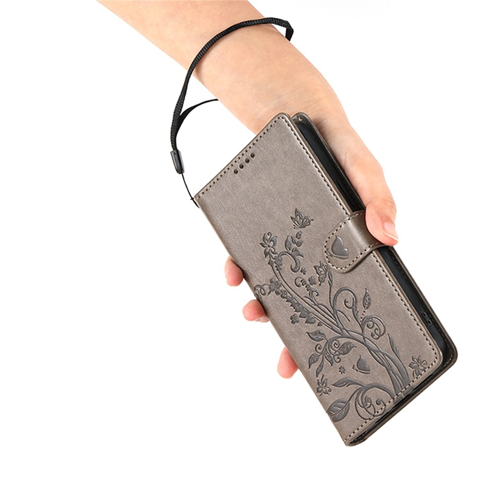 Flowery knížkové pouzdro na Xiaomi Redmi 15 5G (169mm) - šedé