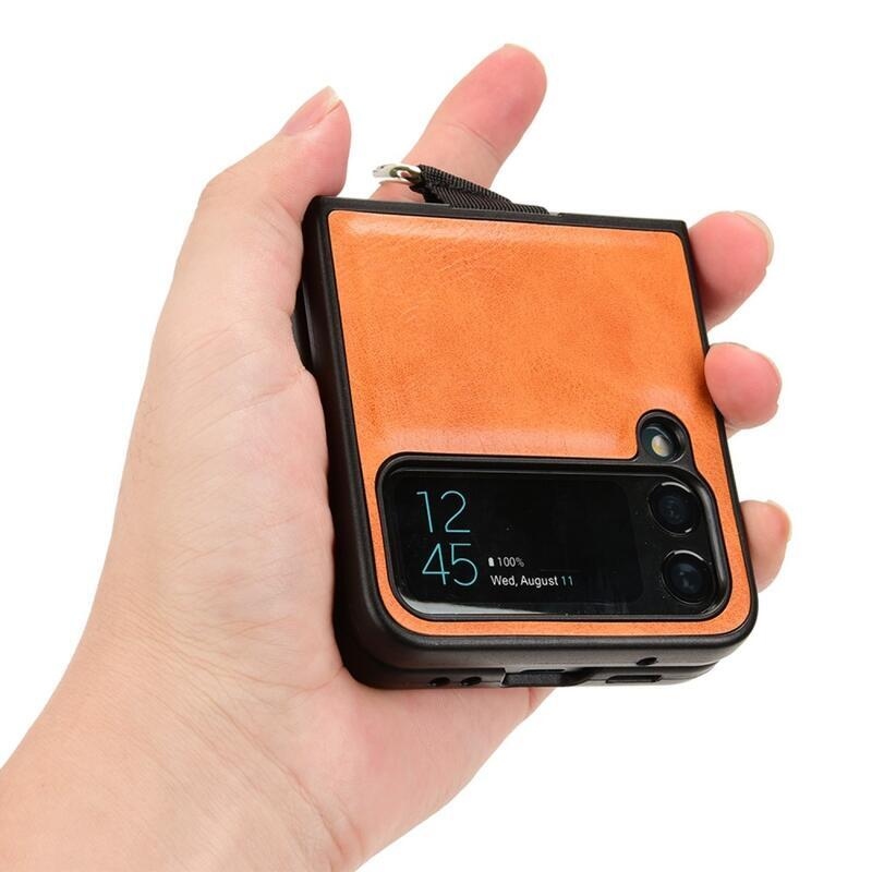 Ring plastový kryt potažený PU kůží s poutkem na mobil Samsung Galaxy Z Flip4 5G - oranžový