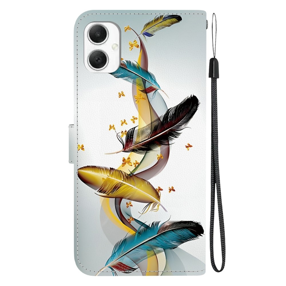 Versatile knížkové pouzdro na Samsung Galaxy A06 4G - zlatá a modrá pírka