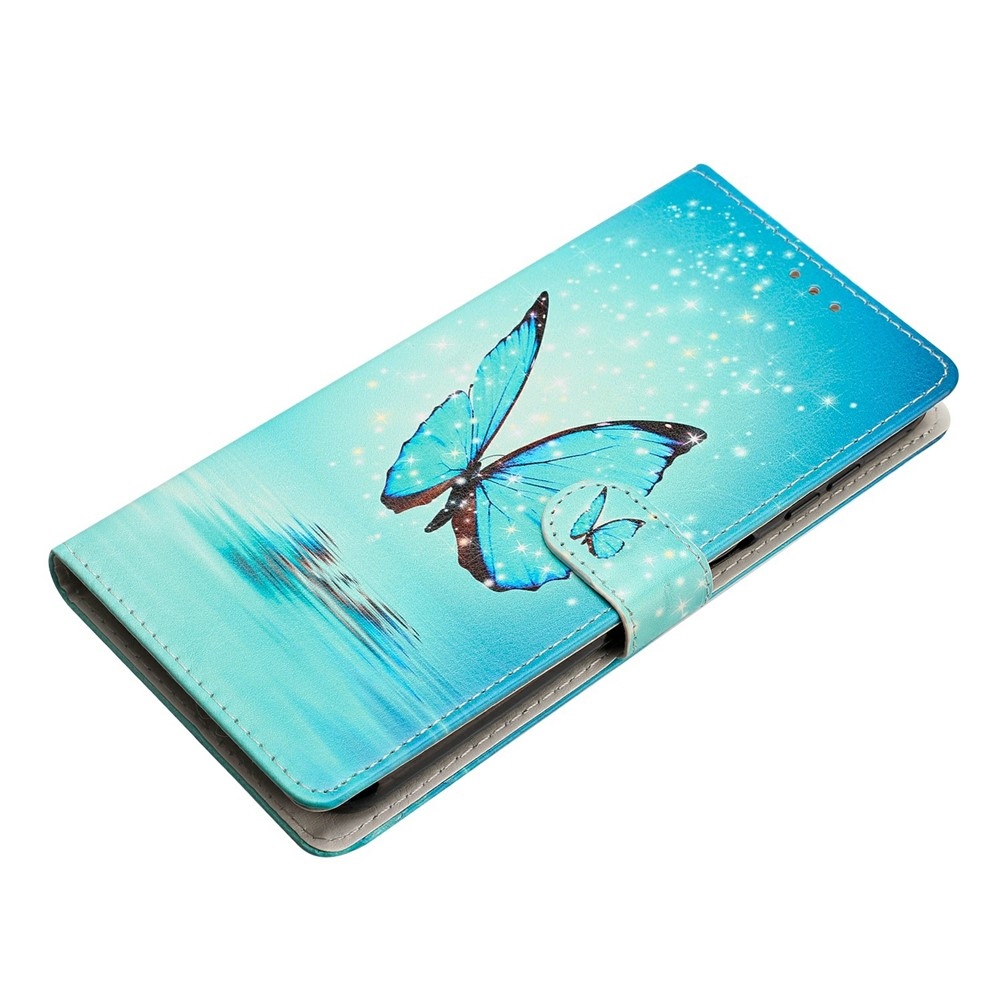 Unique knížkové pouzdro na Xiaomi Redmi 17 4G/5G - modrý motýl