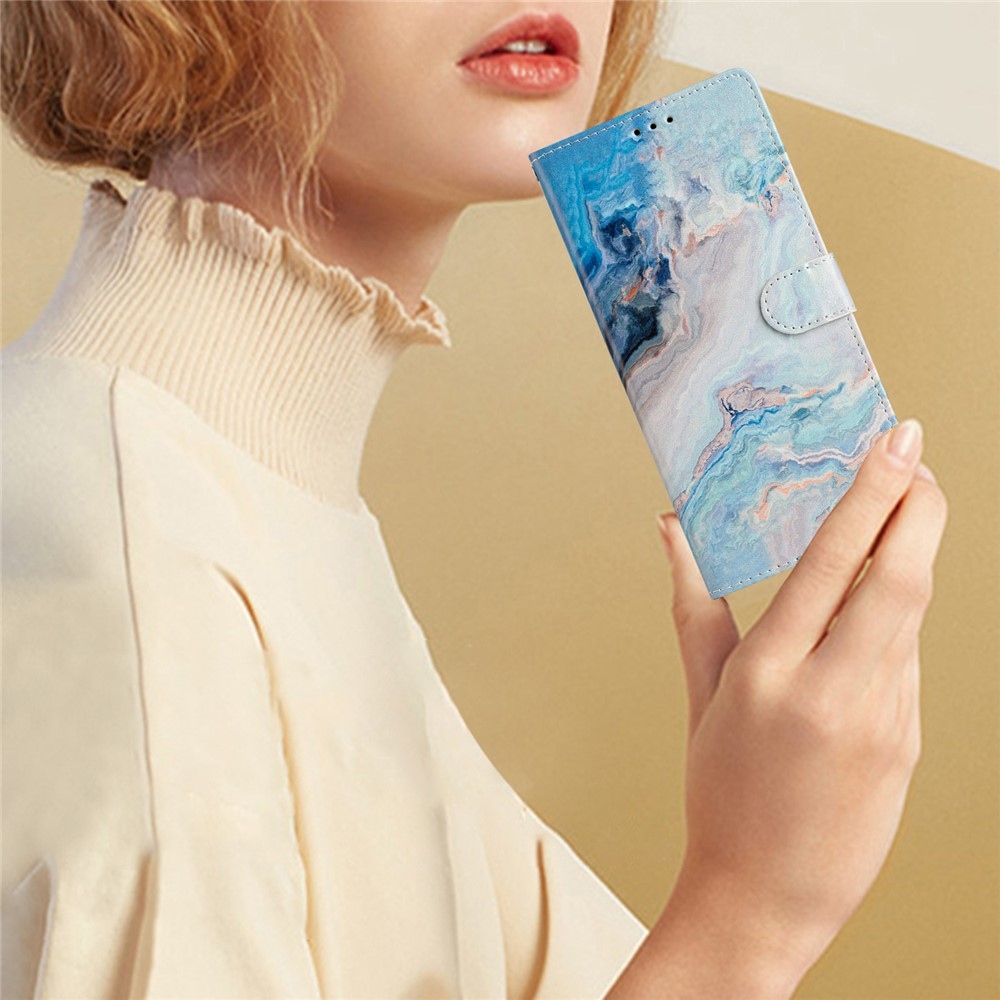 Unique knížkové pouzdro na Xiaomi Redmi Note 17 4G/5G - modrý mramor