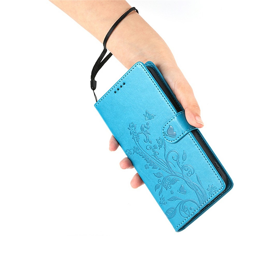 Flowery knížkové pouzdro na Xiaomi Redmi 15 5G (169mm) - modré
