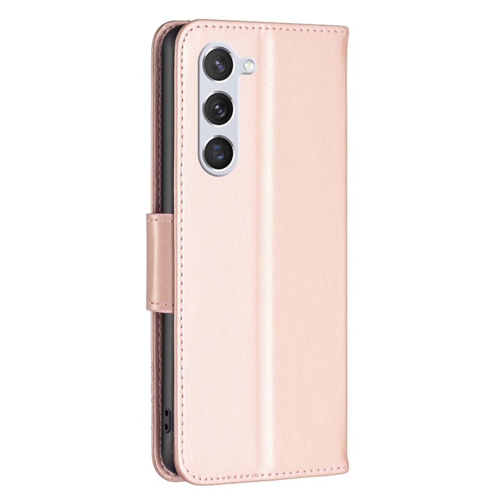 Butterfly knížkové pouzdro na Samsung Galaxy S24 - růžovozlaté