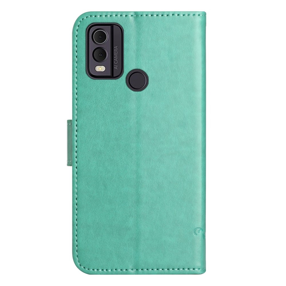 Flower knížkové pouzdro na Nokia C22 - modrozelené